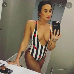 Demi Lovato’s high cut cherry one-piece
